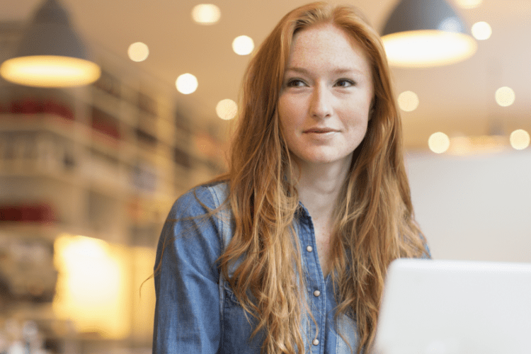 picture of a woman checking email on a laptop